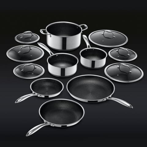 Hexclad 12-piece hybrid cookware set on a dark background
